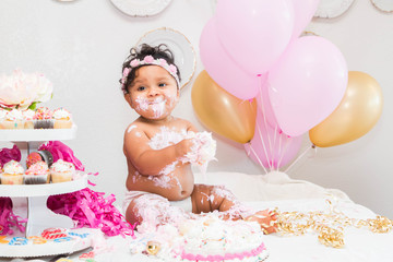 Baby Girl With Cake and Balloons