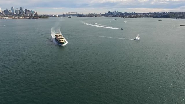 Aerial footage of Sydney Ferry in Sydney Harbour, featuring Sydney CBD, Sydney Skyine, City, Sydney Ferries (ferry), Parramatta River. 