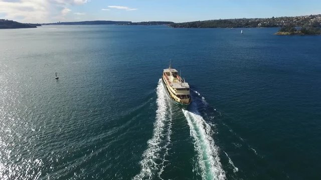 Aerial footage of Sydney Ferry in Sydney Harbour, featuring Sydney CBD, Sydney Skyine, City, Sydney Ferries (ferry), Parramatta River. 