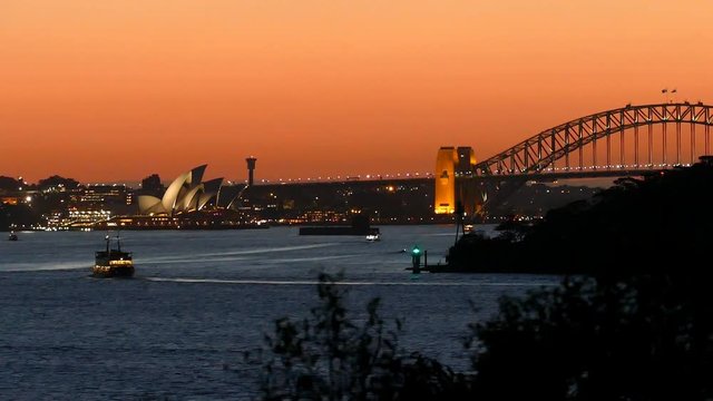 Sydney Harbour on dusk, featuring Sydney CBD, Sydney Skyline, City, Sydney Opera House, Sydney Harbour bridge, Sydney Ferries (ferry), Port Jackson Bay and the Parramatta River.