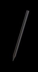 Black pencil isolated on black background