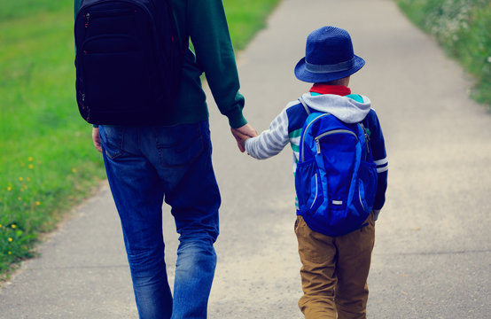 Father Walking Son To School Or Daycare