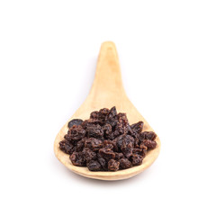 Raisin in wooden spoon  isolated on white background