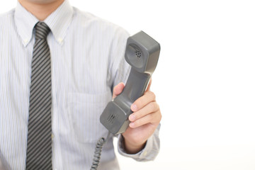 受話器を持つビジネスマン