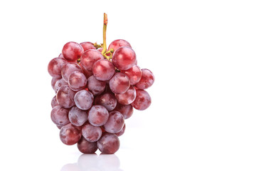 Bunch of red grapes isolated on white background