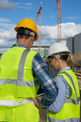 Female engineer and foreman working together