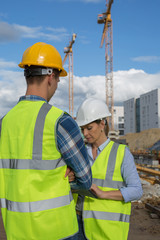 Female engineer and foreman working together