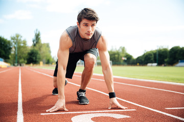 Portrait of the athlete ready to run