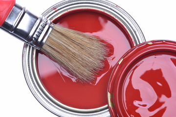 Top view of red paint can with brush isolated on white background
