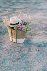 wicker basket with wildflowers