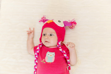 Newborn baby looks surprised