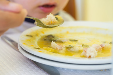 baby eating vegetables