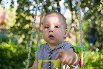 Boy goes for a drive on  swing