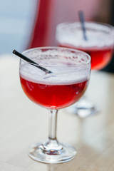Glass of Red Cocktail in the Bar