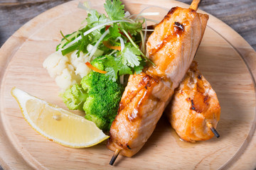 Salmon skewer with soy sauce