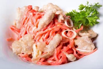 Red asian noodles with chicken