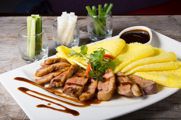 Duck meat with pancakes