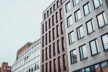 Fototapeta premium City scene from low angle view with row of offices