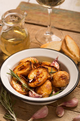 Baked potato with rosemary and garlic
