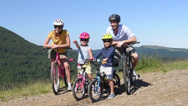 Portrait of happy family on a biking day