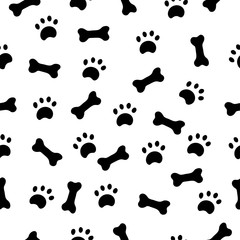 Seamless pattern with paws and bones.