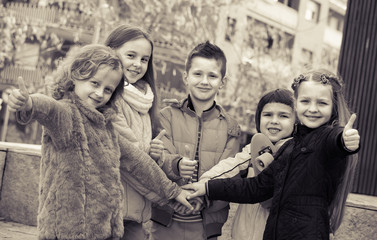 Fototapeta premium Outdoor portrait of junior school kids .