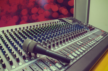Microphone on mixer board.