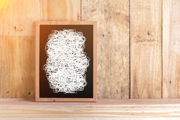 blackboard with white drawing line with wooden floor and wall ba