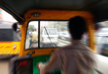 Road scene from moving auto rickshaw motion blur