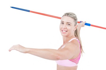 Female athlete throwing a javelin