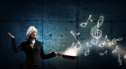 She is going to cook her idea . Mixed media