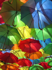 Fototapeta na wymiar Colourful umbrellas in Eastbourne, East Sussex, England,UK