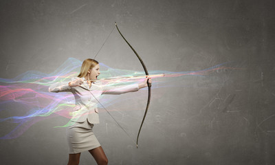 Woman aiming her goal . Mixed media