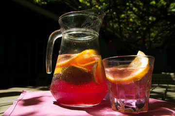 Jar and glass of homemade lemonade