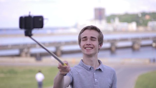 Young man making selfie. 1080p