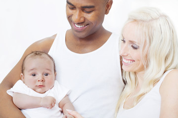 Cheerful interracial family on white background