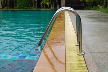 Obraz na płótnie Canvas Swimming pool with stair close up