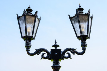 Fototapeta na wymiar Street lights in metallic retro style