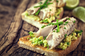 Sandwich with fish and avocado 