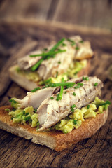 Sandwich with fish and avocado 