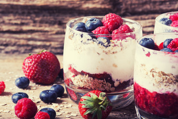 yogurt with oatmeal , blueberries , raspberries and strawberries