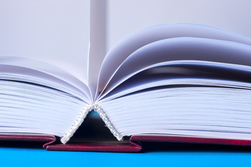 Open book on light table. Back to school. Copy space