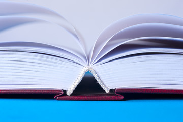 Open book on light table. Back to school. Copy space
