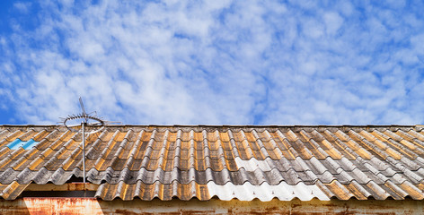 skys cloudy, and a tile roof