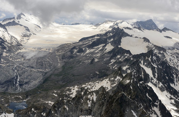 Adamello glacier and lake aerial summer view, Italy