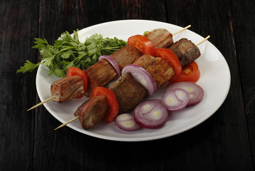 grilled meat on wooden background