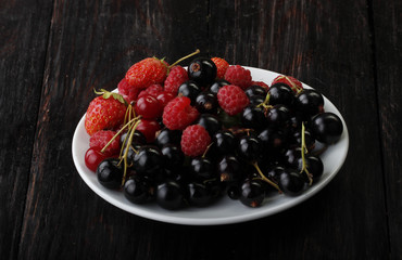 berries on wooden background 