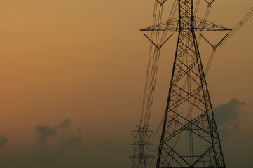Silhouette of high voltage electric tower