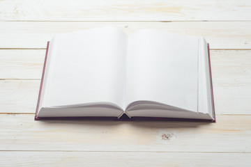 Open book on light table. Back to school. Copy space