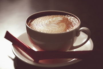 coffee in a cup on a dark background